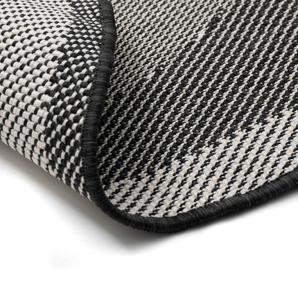 Organisch gevormd buitenkleed Loop Stone Zwart - Vloerkledenloods